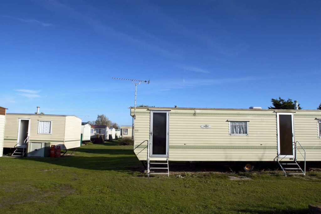caravan-park--norfolk--england--uk-976085146-5c7ec0d646e0fb00011bf3d0
